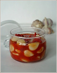 Чеснок маринованный в томатном соке